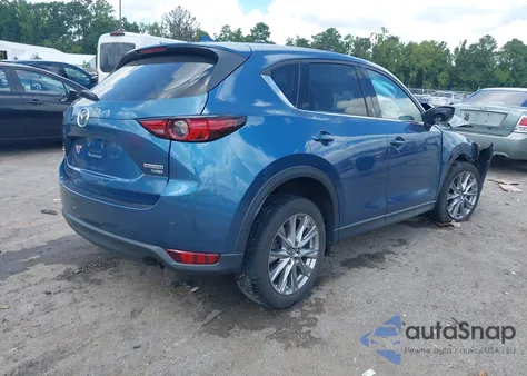 2021 Mazda Cx-5 Grand Touring Reserve z USA, uszkodzony, nr VIN JM3KFBAY7M0350858